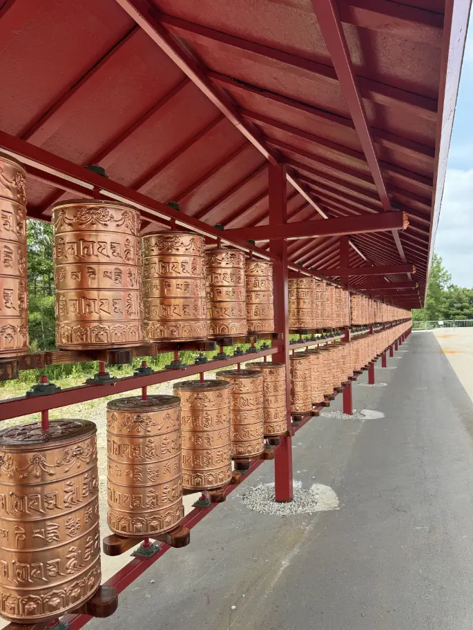 A row of red Buddhist temple bells.